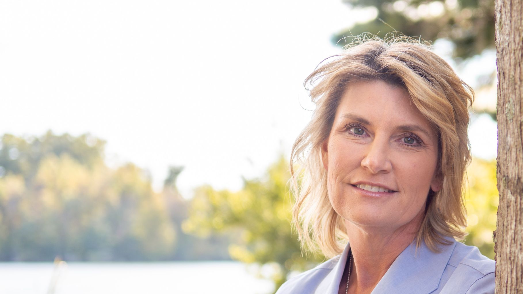 Amy Stern outdoors beside a lake in Berkeley County